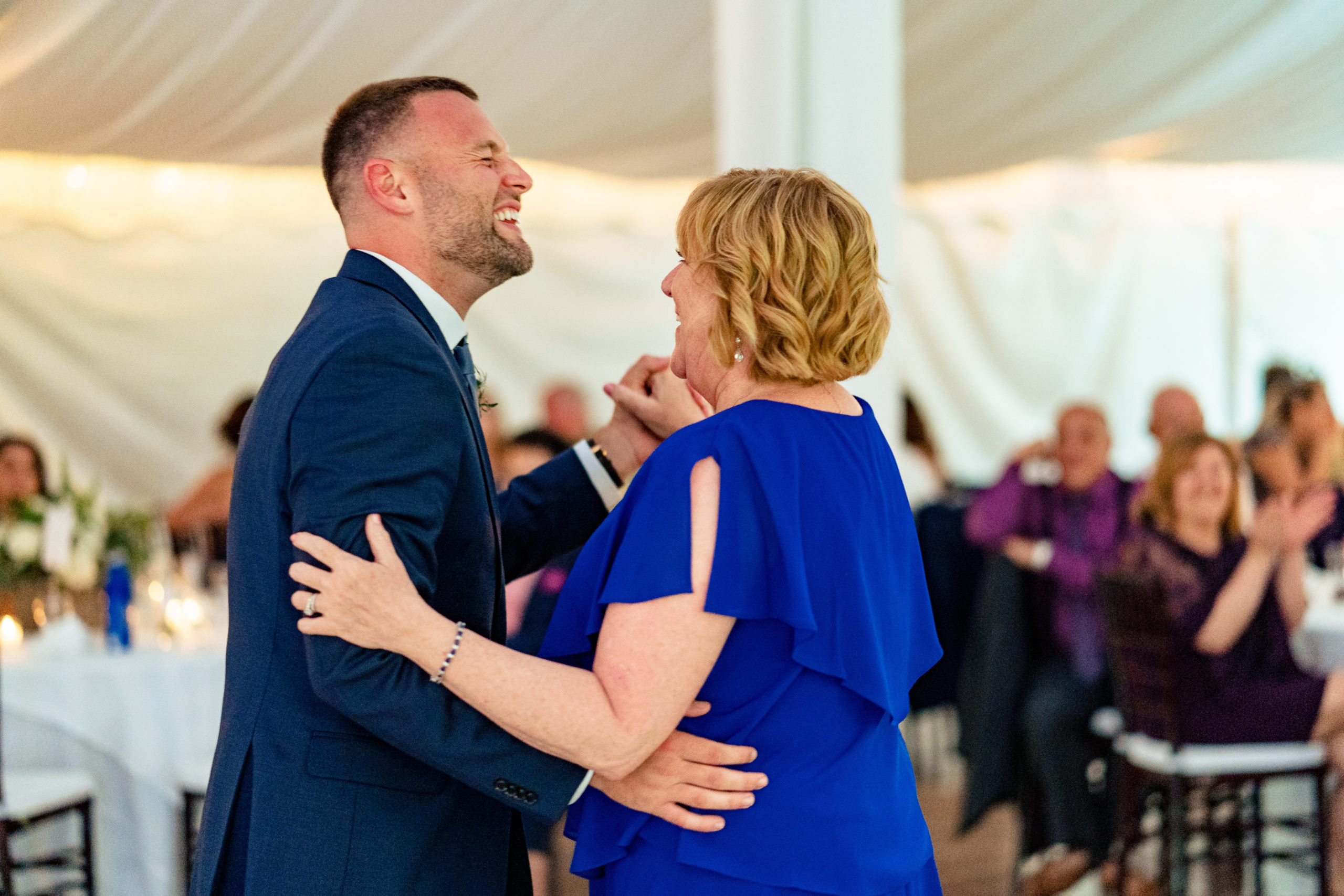 Groom and mother dancing at wedding reception