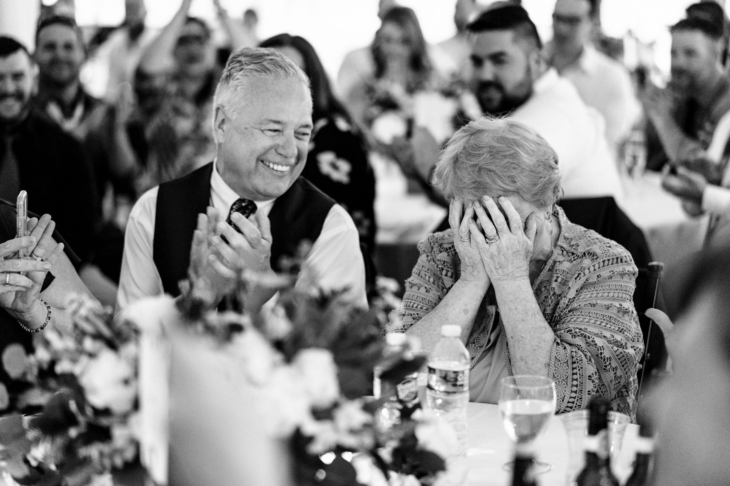 Wedding Guests laughing at best man's speach
